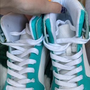 White and teal high top fashion sneakers